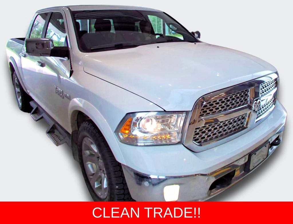 2018 RAM 1500 Laramie Crew Cab 4x4 5'7" Box in White — front three-quarter view